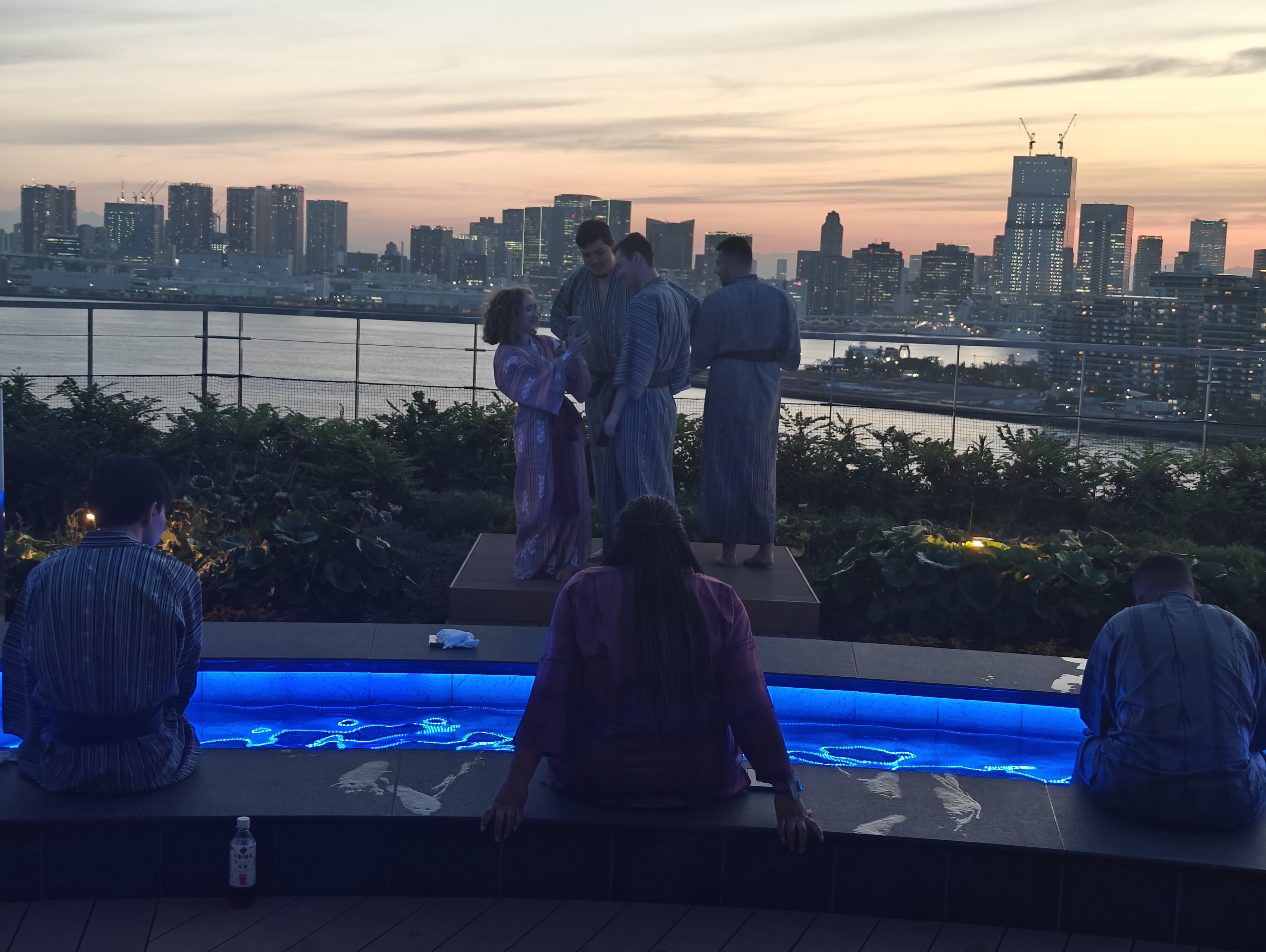 Sunset at rooftop onsen with Tokyo skyline view