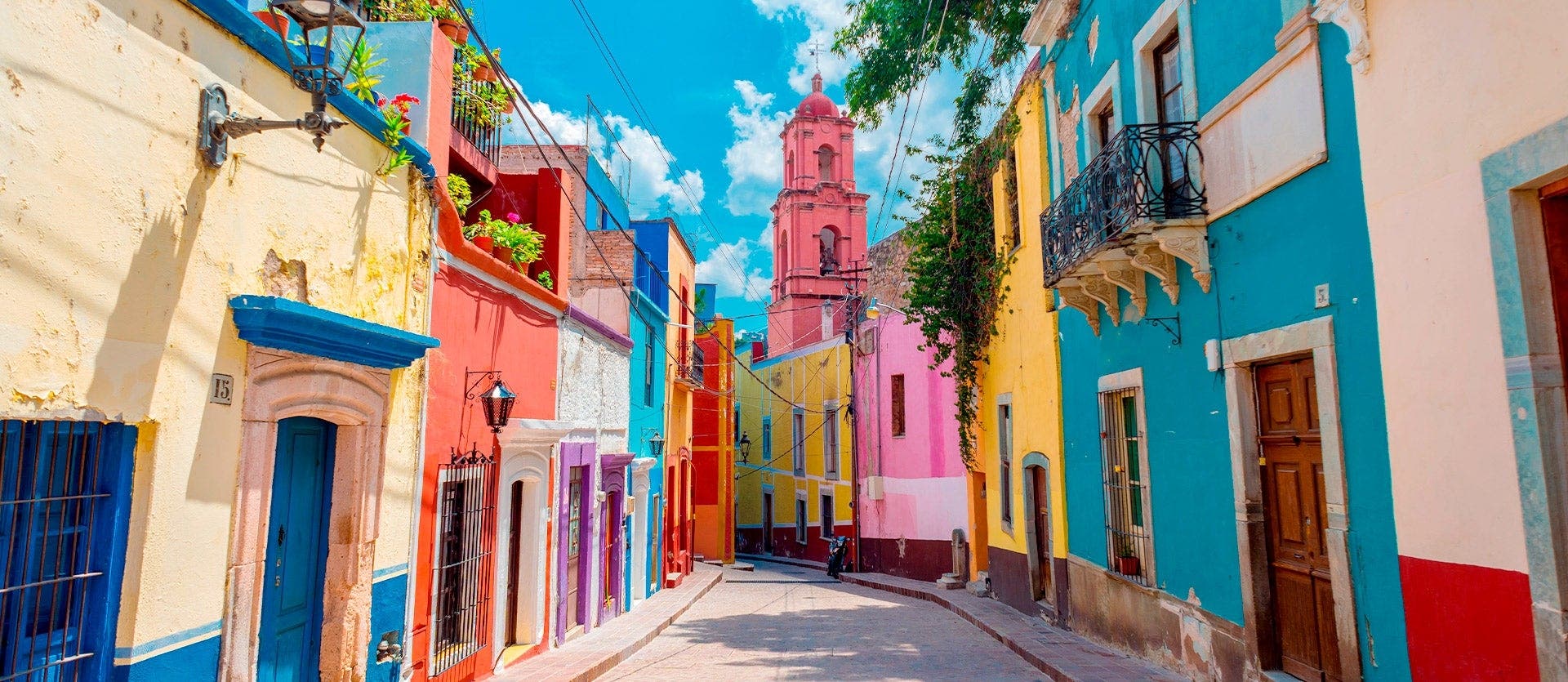 Colorful colonial street in Mexico with vibrant buildings